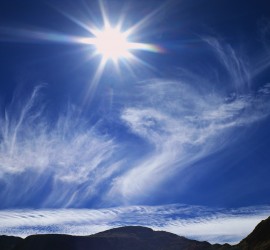 Sun and Wispy Clouds Over Mountains ca. 2001 Toyama, Japan